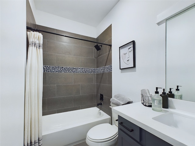 full bathroom featuring shower / bath combo with shower curtain, vanity, and toilet