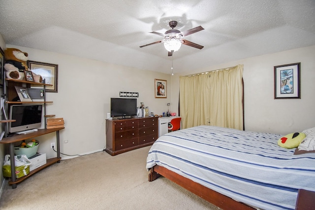 carpeted bedroom with ceiling fan, a textured ceiling, and vaulted ceiling