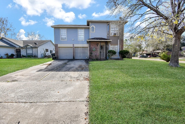 view of front property featuring a front yard and a garage