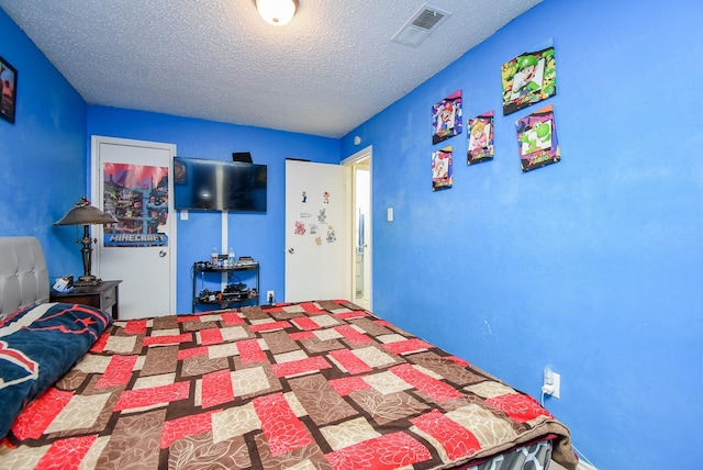 bedroom with a textured ceiling