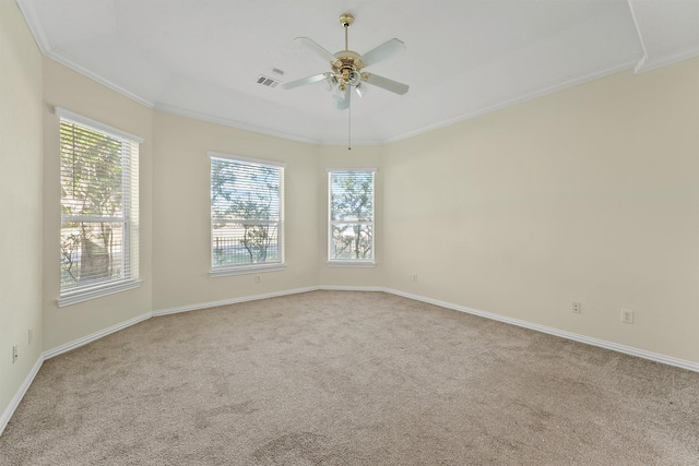 carpeted empty room featuring ceiling fan and ornamental molding