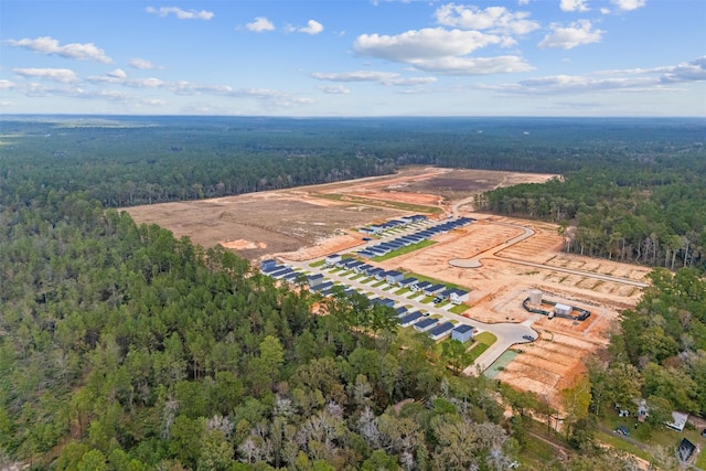 11983 Midas Ln, Willis, TX 77378 - aerial overview of property's location featuring a heavily wooded area