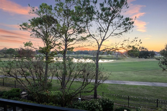 view of property's community featuring a lawn