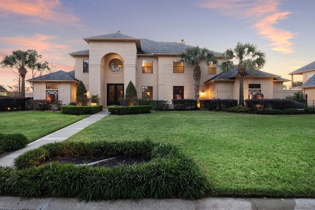 view of front of home featuring a yard