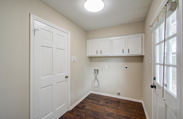 laundry room with cabinets, dark hardwood / wood-style flooring, plenty of natural light, and electric dryer hookup