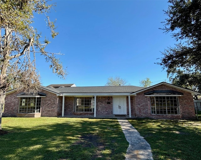 ranch-style home with a front yard