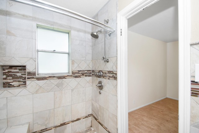 bathroom featuring tiled shower