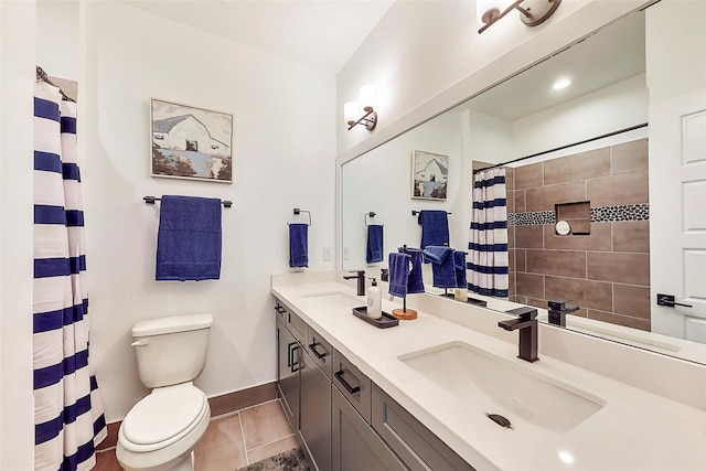 8321 Springwood Creek Ln, Houston, TX 77055 - full bathroom featuring toilet, baseboards, double vanity, a shower with curtain, and tile patterned flooring