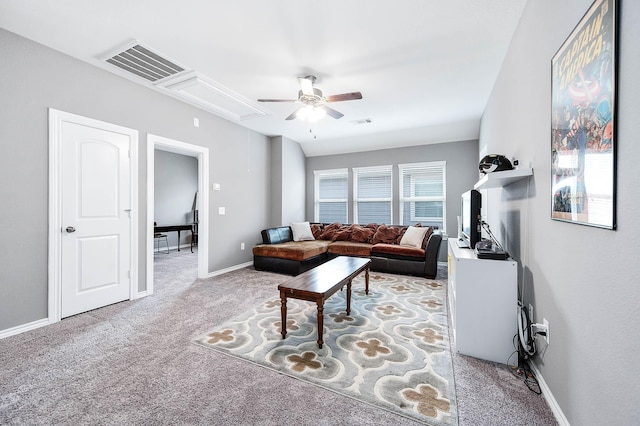 living room with ceiling fan and light colored carpet