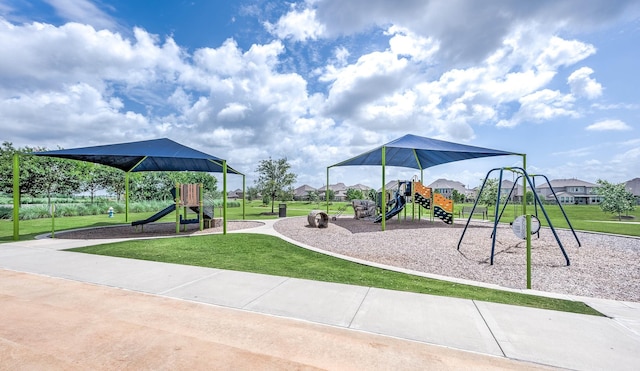 view of playground featuring a lawn