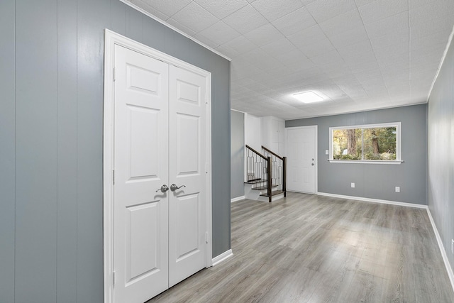 basement featuring light hardwood / wood-style flooring