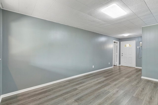 unfurnished room featuring light hardwood / wood-style floors