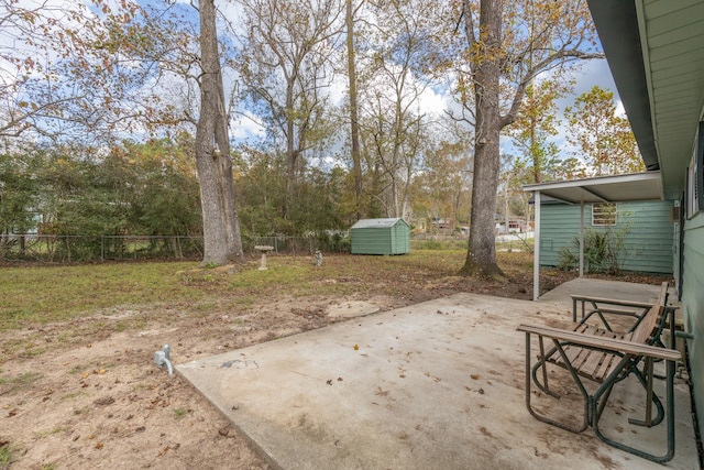 view of patio with a storage shed