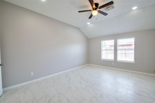 unfurnished room featuring a textured ceiling, vaulted ceiling, and ceiling fan