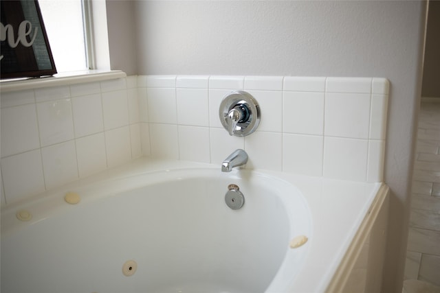 bathroom featuring a bath