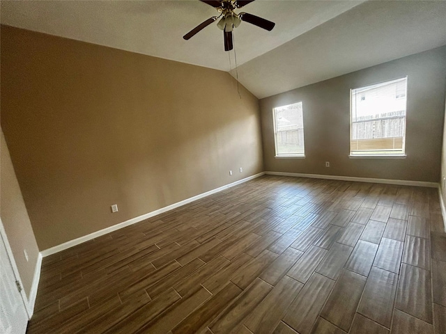 unfurnished room featuring ceiling fan and vaulted ceiling