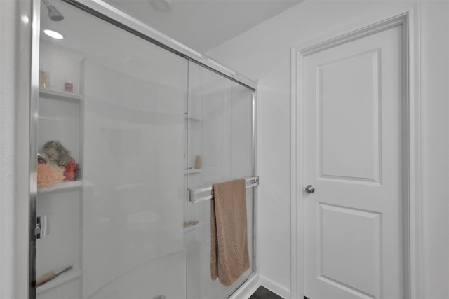 bathroom with an enclosed shower