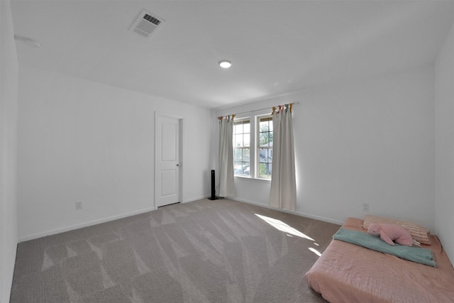 unfurnished bedroom with carpet