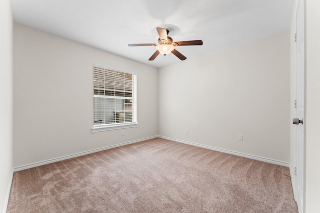 unfurnished room with light colored carpet