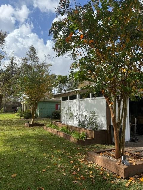 exterior space with a lawn