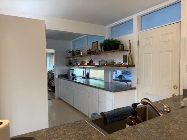 kitchen with white cabinets