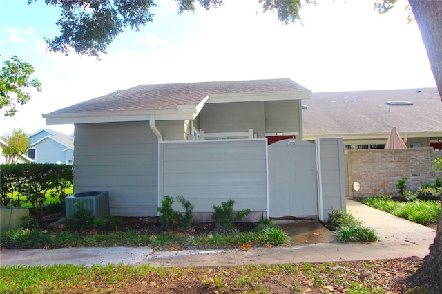 view of front of property featuring central AC unit