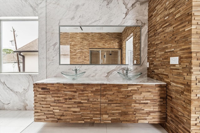 bathroom featuring tile patterned floors and vanity