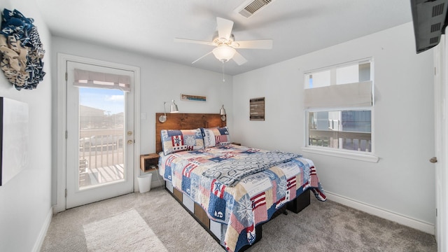 bedroom featuring access to outside, ceiling fan, and light colored carpet