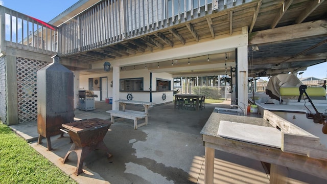 view of patio / terrace featuring a wooden deck