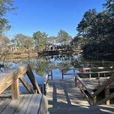 view of dock with a water view