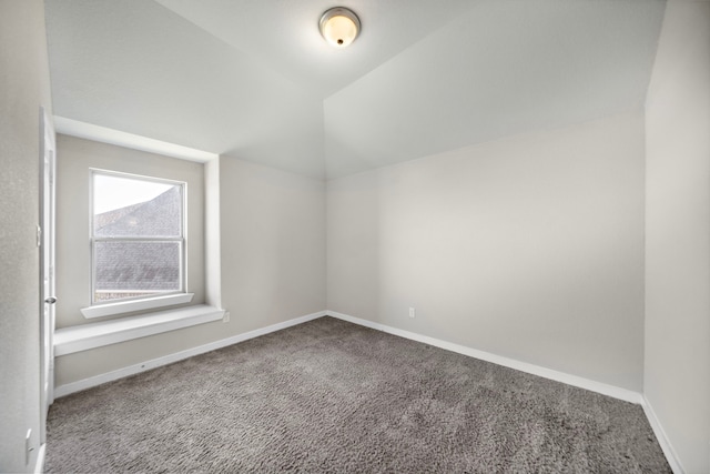 bonus room featuring carpet and vaulted ceiling