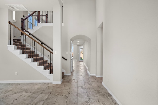 entryway featuring a high ceiling