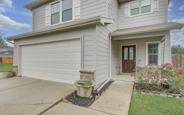 property entrance with a garage