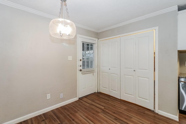 unfurnished bedroom with dark hardwood / wood-style floors and ornamental molding