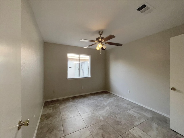 unfurnished room with ceiling fan