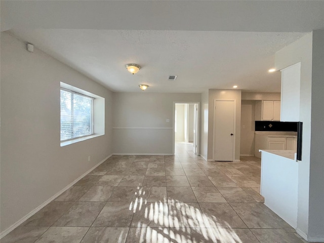 view of tiled spare room