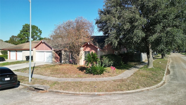 view of front of property with a garage