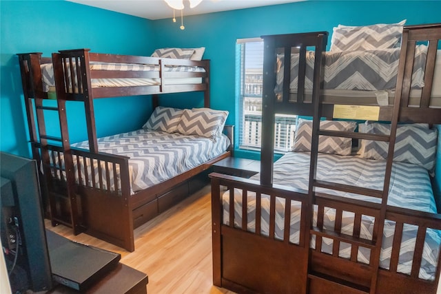 bedroom featuring light hardwood / wood-style flooring and breakfast area