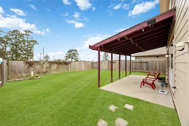 view of yard with a patio area