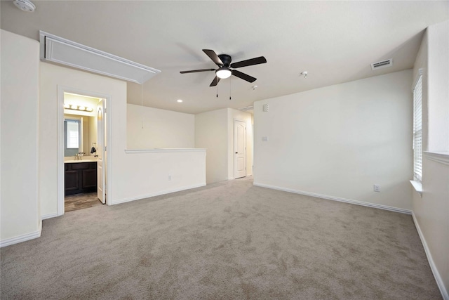 interior space with ceiling fan