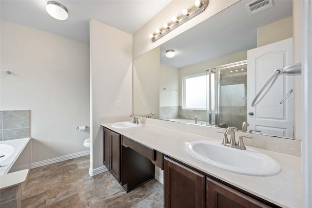 full bathroom with vanity, toilet, and plus walk in shower