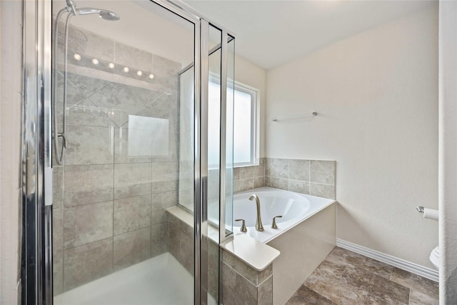 bathroom with independent shower and bath