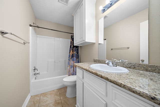 full bathroom featuring tile patterned floors, a textured ceiling, toilet, vanity, and shower / tub combo