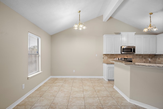 kitchen featuring stove, white cabinets, vaulted ceiling with beams, tasteful backsplash, and a notable chandelier