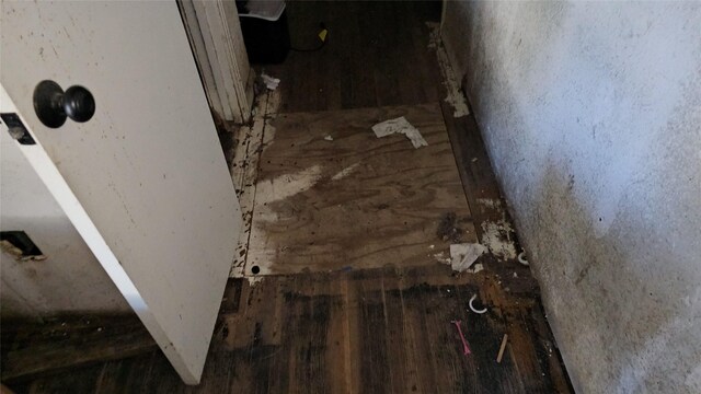 interior details featuring hardwood / wood-style flooring