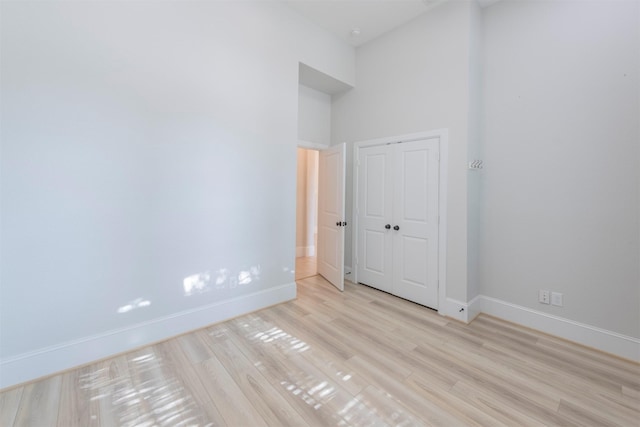 spare room with light wood-type flooring