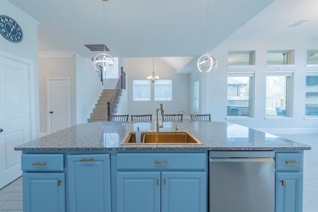 kitchen featuring dishwasher, sink, a notable chandelier, an island with sink, and pendant lighting