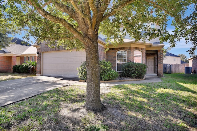 single story home with central air condition unit and a front lawn