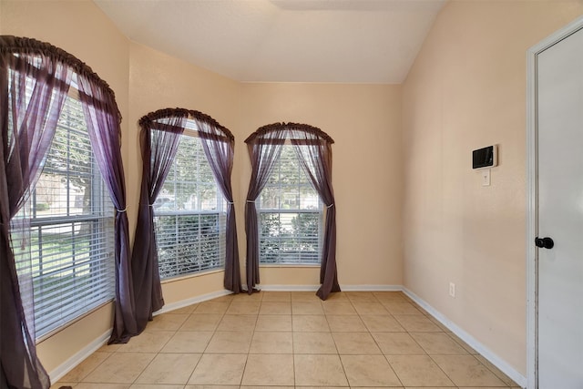 empty room with light tile patterned flooring