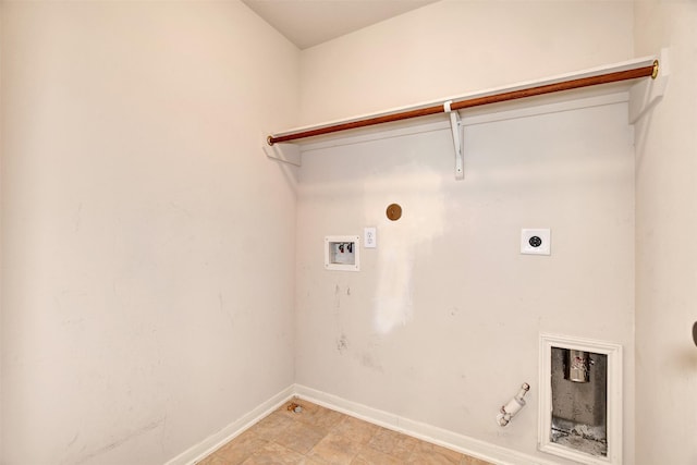 clothes washing area with electric dryer hookup, gas dryer hookup, and hookup for a washing machine